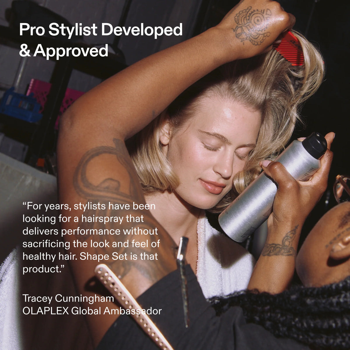 A woman with short blonde hair has her hair styled with a silver hairspray can by another stylist. Large text on the image reads 'Pro Stylist Developed & Approved' and includes a quote and the name Tracey Cunningham, OLAPLEX Global Ambassador.