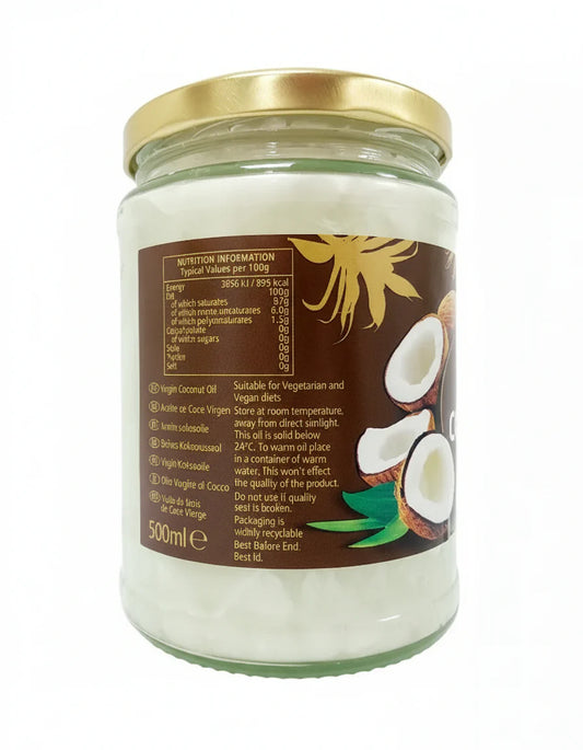 Jar of coconut oil with a gold lid on a white background
